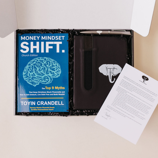 Custom event gift box featuring the book 'Money Mindset Shift' by Toyin Crandell, a branded notebook, pen, and welcome letter - curated by Lavender + Pine