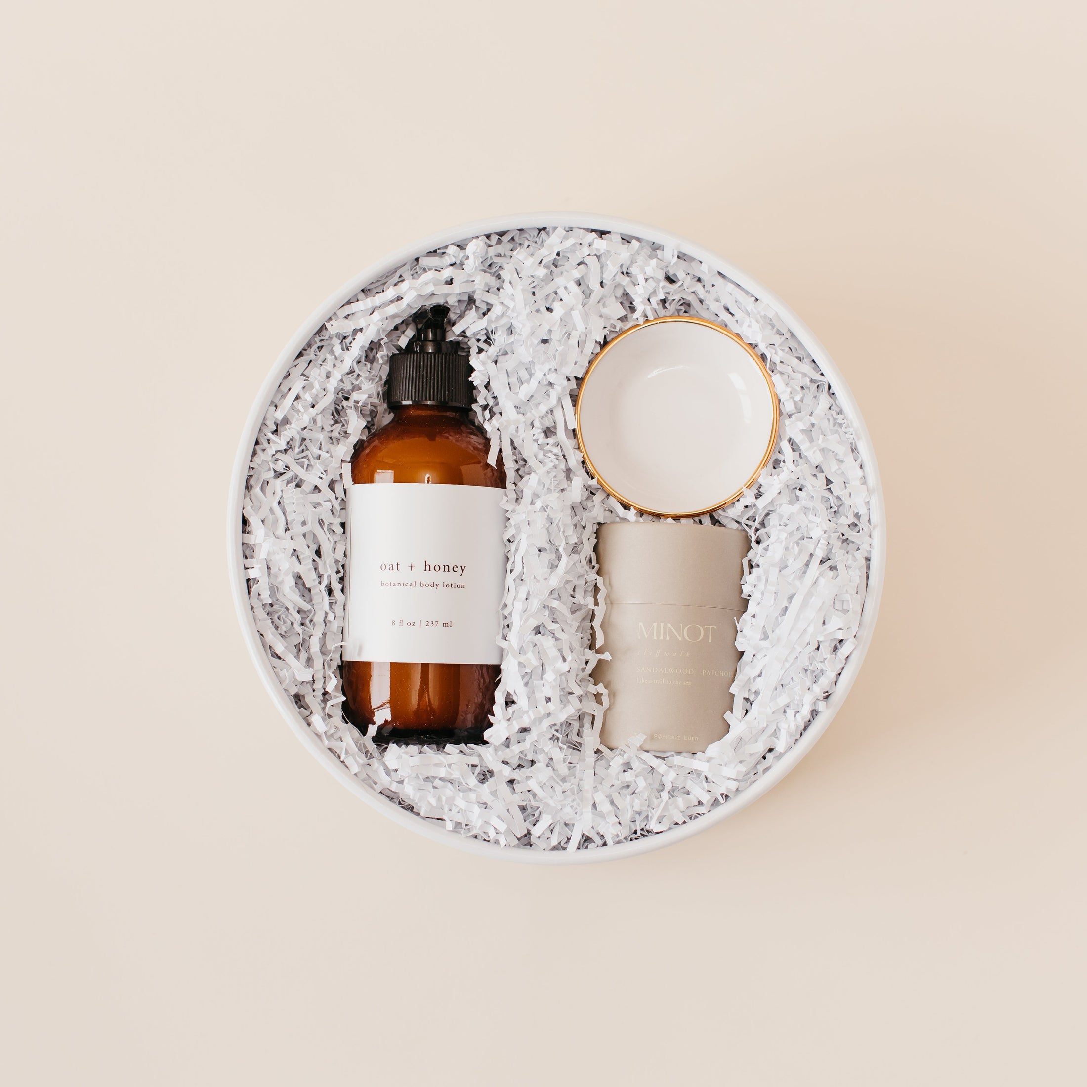 Lavender and Pine I Do Gift Box featuring Roote oat and honey botanical body lotion, Apricity Ceramics gold rim ring dish, and Minot candle in white round gift box